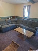 Full view of sectional sofa in living room