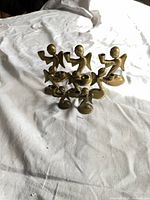 Group of brass angel candle holders
