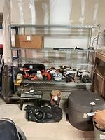 Full view of assembled chrome wire shelving unit populated with items