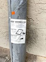 Carry bag showing Coleman Vacationer II Tent label and instructions