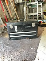 Front view of closed Craftsman toolbox showing latches, logo and two drawers