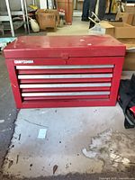 Front view closed chest showing Craftsman logo, five drawers, latch