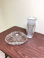vase and divided dish together on table