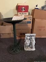 Full view of bird bath stand, basin and separate resin figurine
