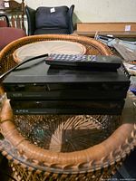 Stacked view of both converter boxes with remote on top