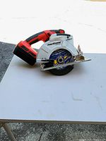 Left side view showing Firestorm branding, blade, battery