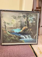 Full view of framed landscape painting