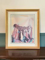 full framed print showing baby raised by hands