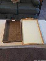 Both trays side by side showing color, handles and size comparison