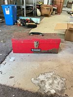 Closed Husky toolbox showing handle, latch and rust