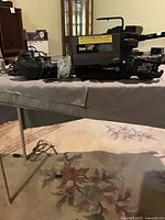 Camcorder with accessories on table