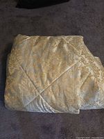 Comforter folded showing pattern and color