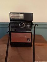 Front view showing lens, flash, focus dial, Kodak logo and overall wear