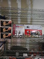 Shelf view showing all three packaged door hardware sets