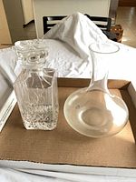 Both decanter with stopper and carafe side by side