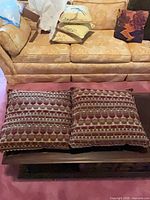 Both pillows side by side on table; shows pattern and size