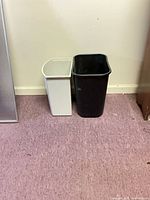 front view of both trash cans side by side