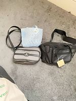 All three bags side by side on floor