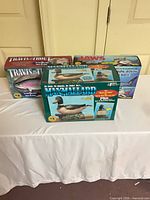 All three boxed animatronic toys on table