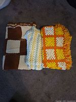 All three folded afghans side-by-side