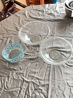 All three glass bowls top view showing sizes and colors