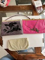 Group shot of three vintage evening bags