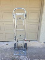 Front view of folded Magliner Gemini SR hand truck