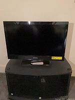 Front view of Magnavox 30" TV on stand