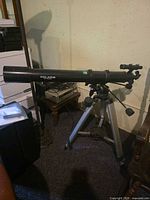 Full view of telescope on tripod with finder scope attached
