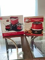 Both boxed appliances side by side