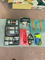 Full lot overview showing clipper box, grooming kit, flats, bag, gloves, potholder