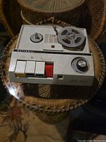 Front angled view of recorder showing controls and reel