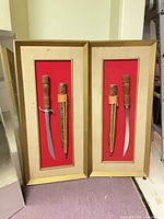 Front view showing both framed dagger displays