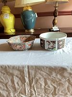 Both decorative bowls shown side by side on table