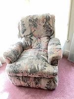 Front view of patterned fabric recliner chair