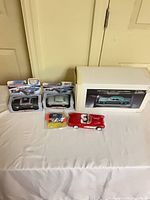 All four Road Champs cars with packaging visible