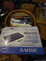 Both boxed DVD players showing fronts of packages