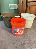 All three buckets side by side for size and condition comparison