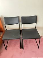 Front view of both chairs showing overall design and condition