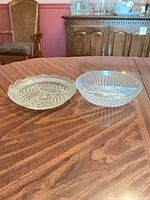 Both glass serving dishes side by side on table