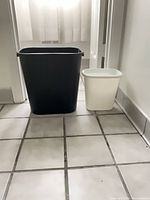 Front view of both trash cans side by side