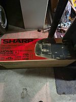Front view of Sharp CD-C472 retail box