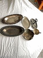 All six silver-plated pieces on sheet
