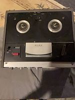 Top view of Sony reel-to-reel deck showing reel hubs and head cover