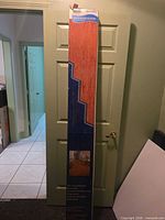Full view of unopened box of Surface Source hardwood flooring
