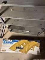 Boxed pair of Ultra-Ramps on floor