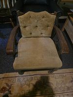 Front view showing tufted back, seat and overall condition