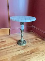 Assembled pedestal stand with marble top