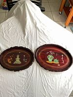 Both trays front view showing designs and size relation
