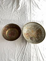 Both bowls top view showing patterns and condition